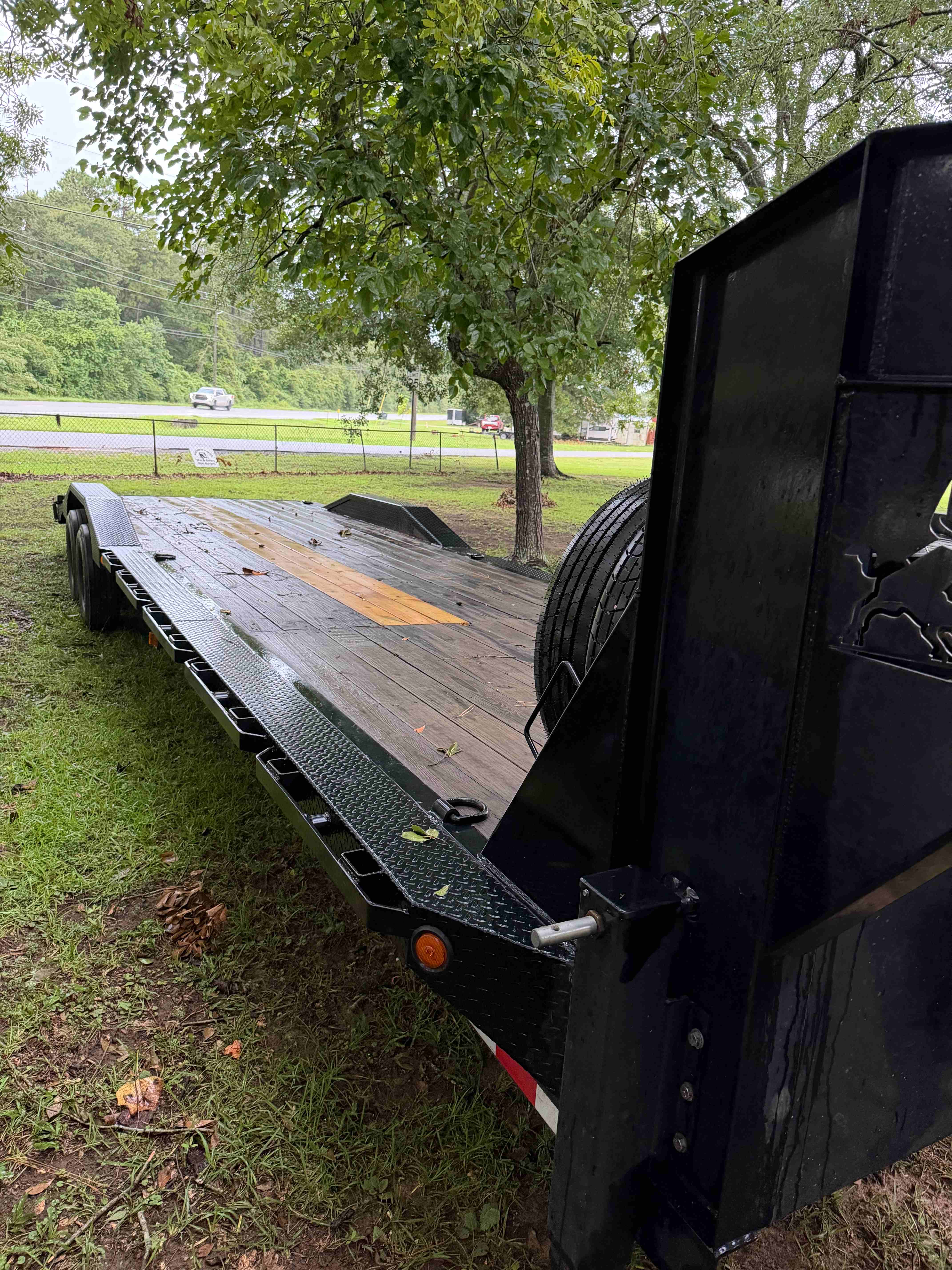32ft Ironbull Gooseneck Lowboy Trailer rental - Maximum stability for hauling heavy equipment in Northwest Florida